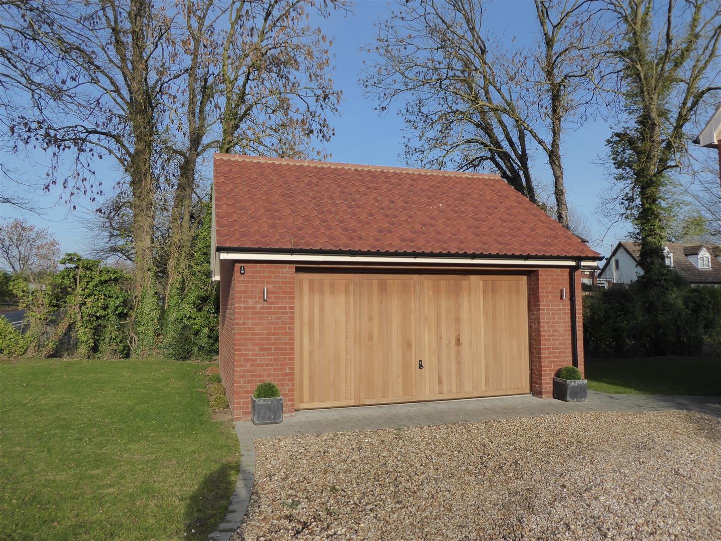 DOUBLE DETACHED BRICK GARAGE